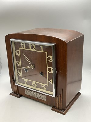 Lot 1360 - An Art Deco walnut mantel clock with Arabic...