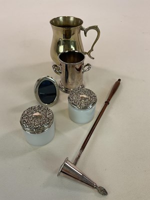 Lot 1039 - Two silver embossed topped jars, a silver...