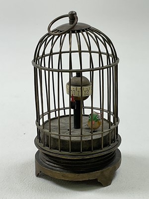 Lot 44 - An early 20th century novelty single bird...