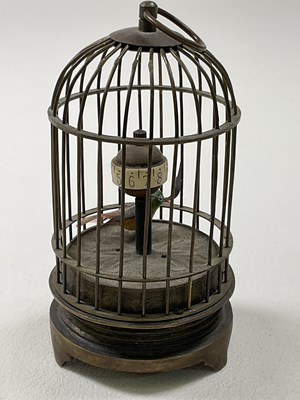 Lot 44 - An early 20th century novelty single bird...