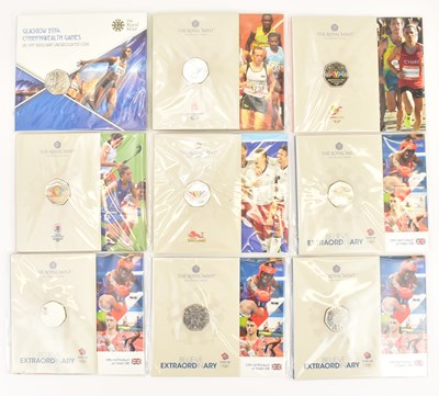 Lot 640 - THE ROYAL MINT; nine 'Commonwealth Games' 50p...