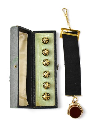 Lot 826 - A yellow metal watch fob set with bloodstone...