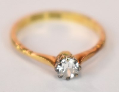 Lot 1240 - An 18ct yellow gold platinum tipped diamond...