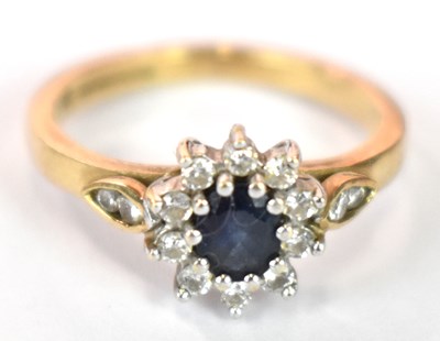 Lot 1242 - A 9ct yellow gold floral dress ring, size L,...