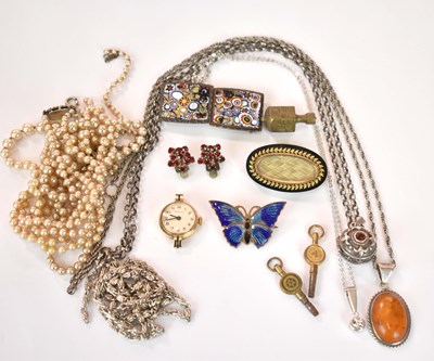 Lot 1246 - A small group of costume jewellery, including...