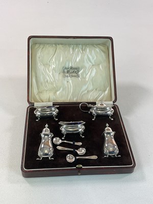 Lot 1043 - A cased George V hallmarked silver five piece...