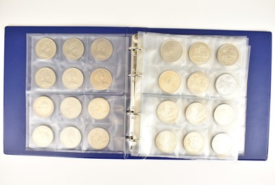 Lot 679 - A blue coin album containing approximately...