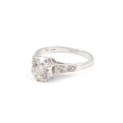 Lot 691 - A platinum ring claw set with solitaire...