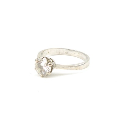 Lot 738 - A solitaire ring claw set with brilliant cut...