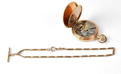 Lot 868 - A 9ct gold trombone link Albert chain set with...