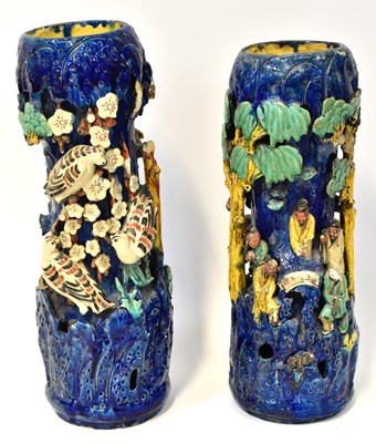 Lot 433 - A pair of Chinese-style Shiwan pottery vases...