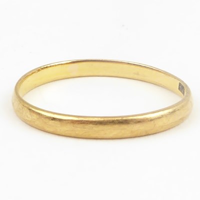 Lot 693 - A 22ct gold thin wedding band, size M, approx...