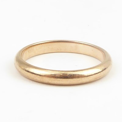 Lot 731 - A 9ct rose gold wedding band, size P, approx....