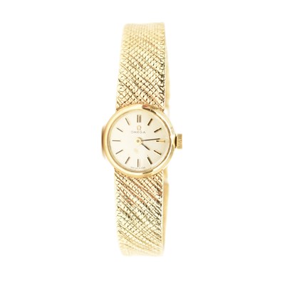Lot 879 - OMEGA; a ladies' 9ct gold vintage wristwatch,...