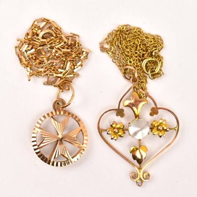 Lot 780 - Two 9ct gold pendants and chains, one with...