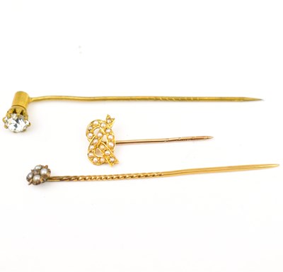 Lot 758 - Three yellow metal pins, comprising one with...
