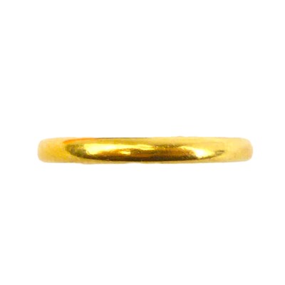 Lot 694 - A 22ct gold thin wedding band, size M, approx....