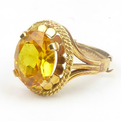 Lot 737 - A Dutch gold and citrine dress ring, size M,...