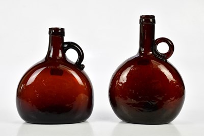 Lot 2628 - Two 19th century amber glass spirit flasks,...