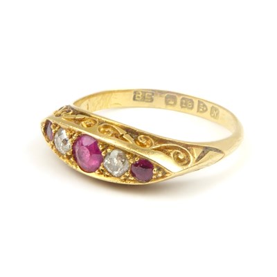 Lot 698 - An 18ct gold diamond and ruby Victorian-style...