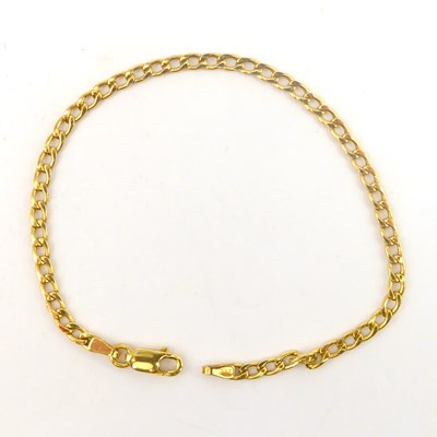 Lot 743 - A 9ct gold flat curb link bracelet with...