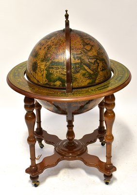 Lot 18 - A reproduction drinks cabinet in the form of a...