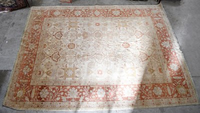 Lot 1449 - A good quality wool carpet, with floral detail...