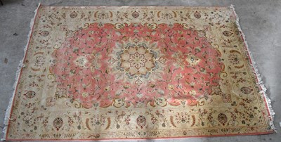 Lot 1448 - A Chinese wool carpet, decorated to the centre...