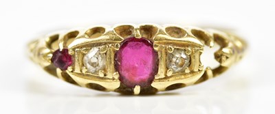 Lot 254 - An 18ct yellow gold ruby and diamond ring (one...
