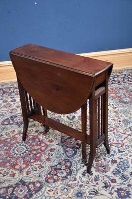 Lot 1093 - An Edwardian inlaid mahogany Sutherland table,...