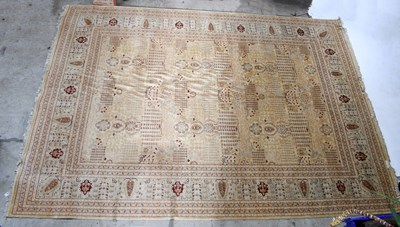 Lot 1447 - A large wool carpet, decorated with floral...