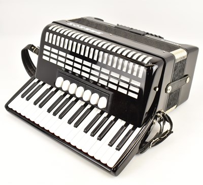 Lot 531 - HOHNER; a student seventy-two bass accordion,...