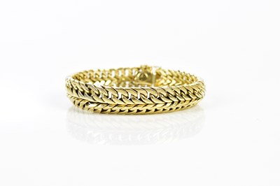 Lot 264 - An 18ct yellow gold heavy broad chevron link...