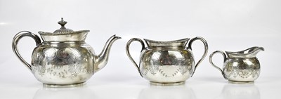 Lot 2034 - MAPPIN & WEBB; a silver plated three piece tea...