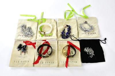 Lot 942 - TED BAKER; a clear crystal bracelet and...