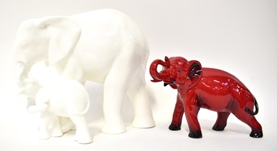 Lot 393 - ROYAL DOULTON; a white figure group of two...