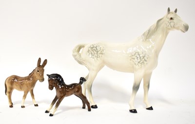 Lot 383 - BESWICK; three figures comprising a dappled...