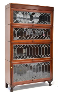 Lot 22 - A mahogany four-section solicitor's bookcase...