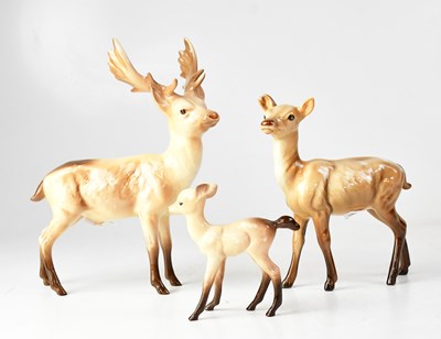 Lot 381 - BESWICK; a family of three deer figures,...