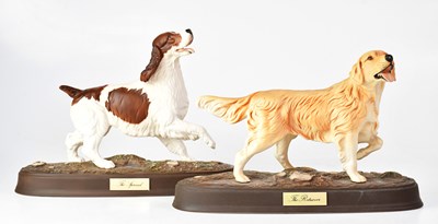 Lot 386 - BESWICK; two matt glazed figures of dogs...