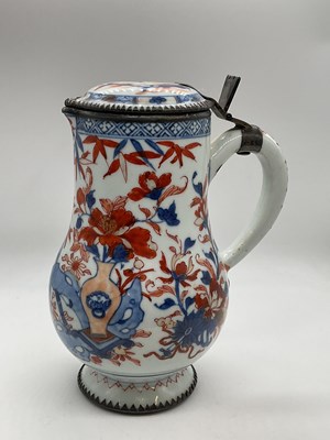 Lot 501 - An 18th century Chinese tankard with white...