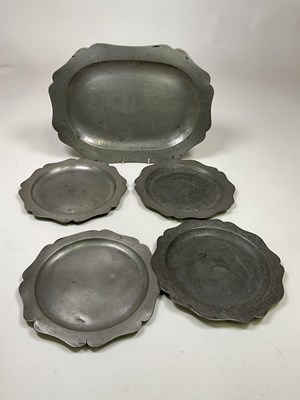 Lot 436 - An 18th/19th century pewter platter of rounded...