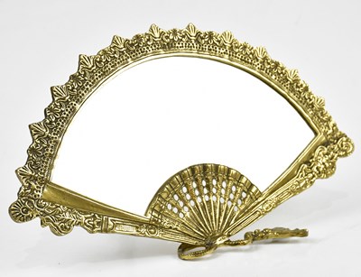Lot 1431 - A modern brass miror in the form of a fan,...