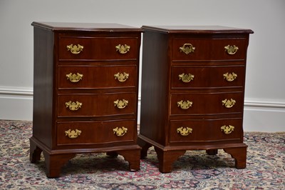 Lot 1139 - A pair of reproduction mahogany serpentine...