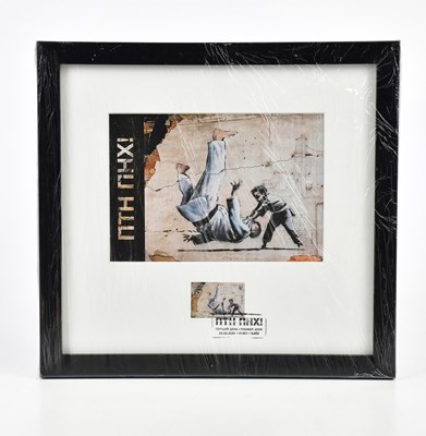 Lot 68 - AFTER BANKSY; Ukraine mural framed card with...