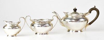 Lot 586 - WALTER & CHARLES SISSONS; an Edwardian...