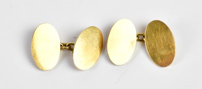 Lot 483 - A pair of cased 18k yellow gold cufflinks,...
