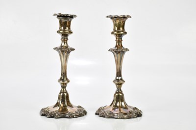 Lot 2035 - A pair of silver plated candle sticks of...