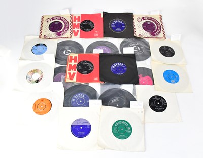 Lot 282 - A collection of 45rpm singles to include Elvis...