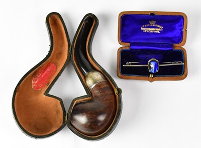 Lot 763 - A white metal bar brooch set with an enamel...